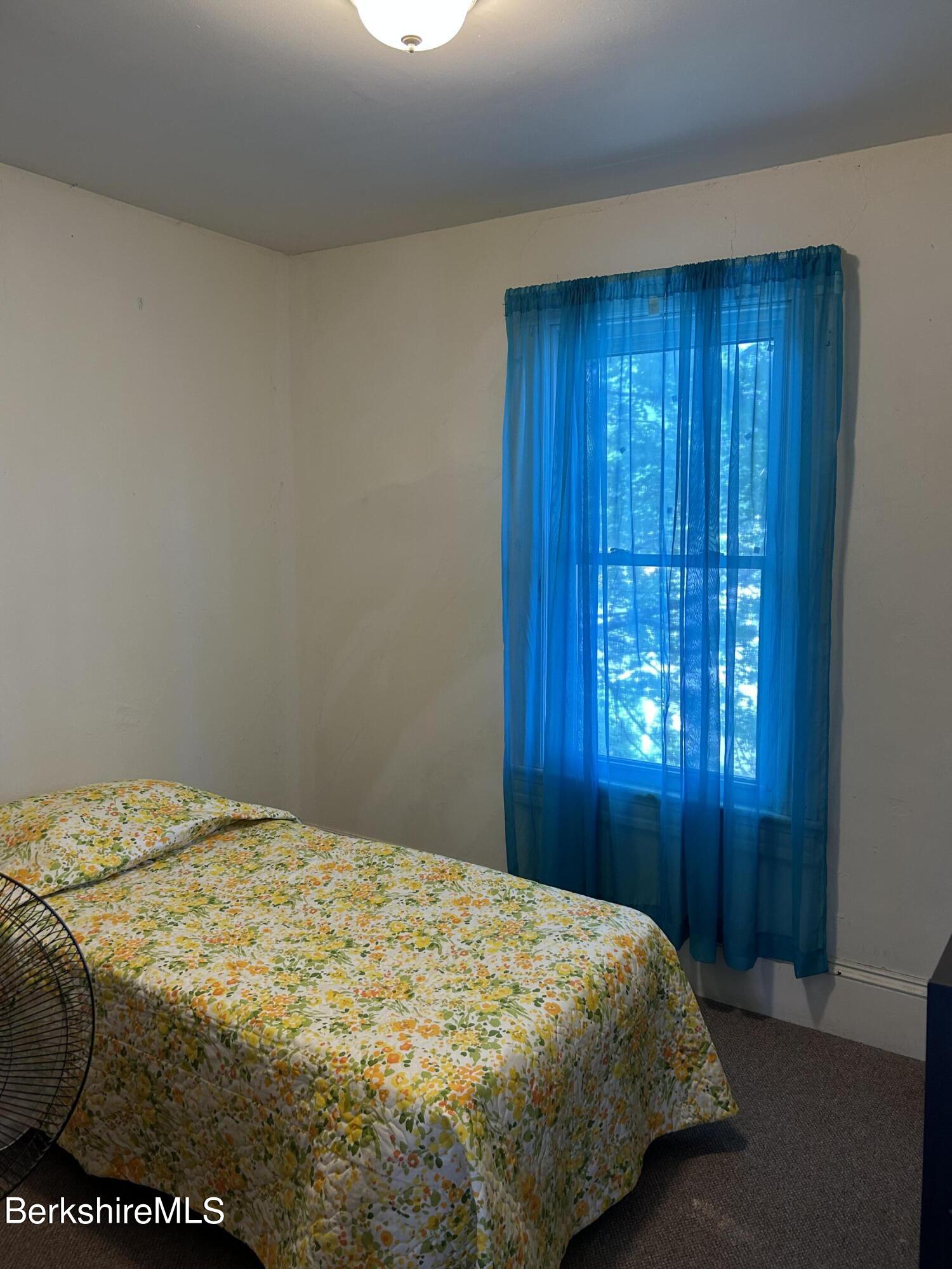 46 Summer Street Adams, MA 01220 - Photo 26 of 35 a bedroom with a bed and a window