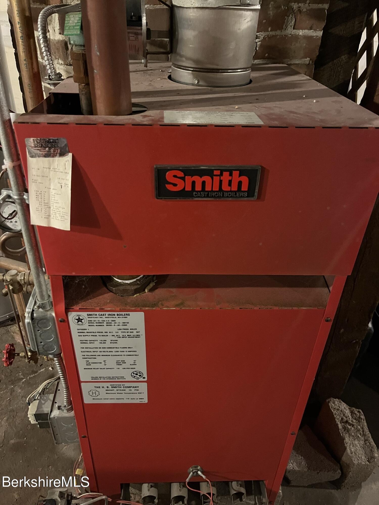 46 Summer Street Adams, MA 01220 - Photo 32 of 35 a room with stainless steel appliances wooden floor