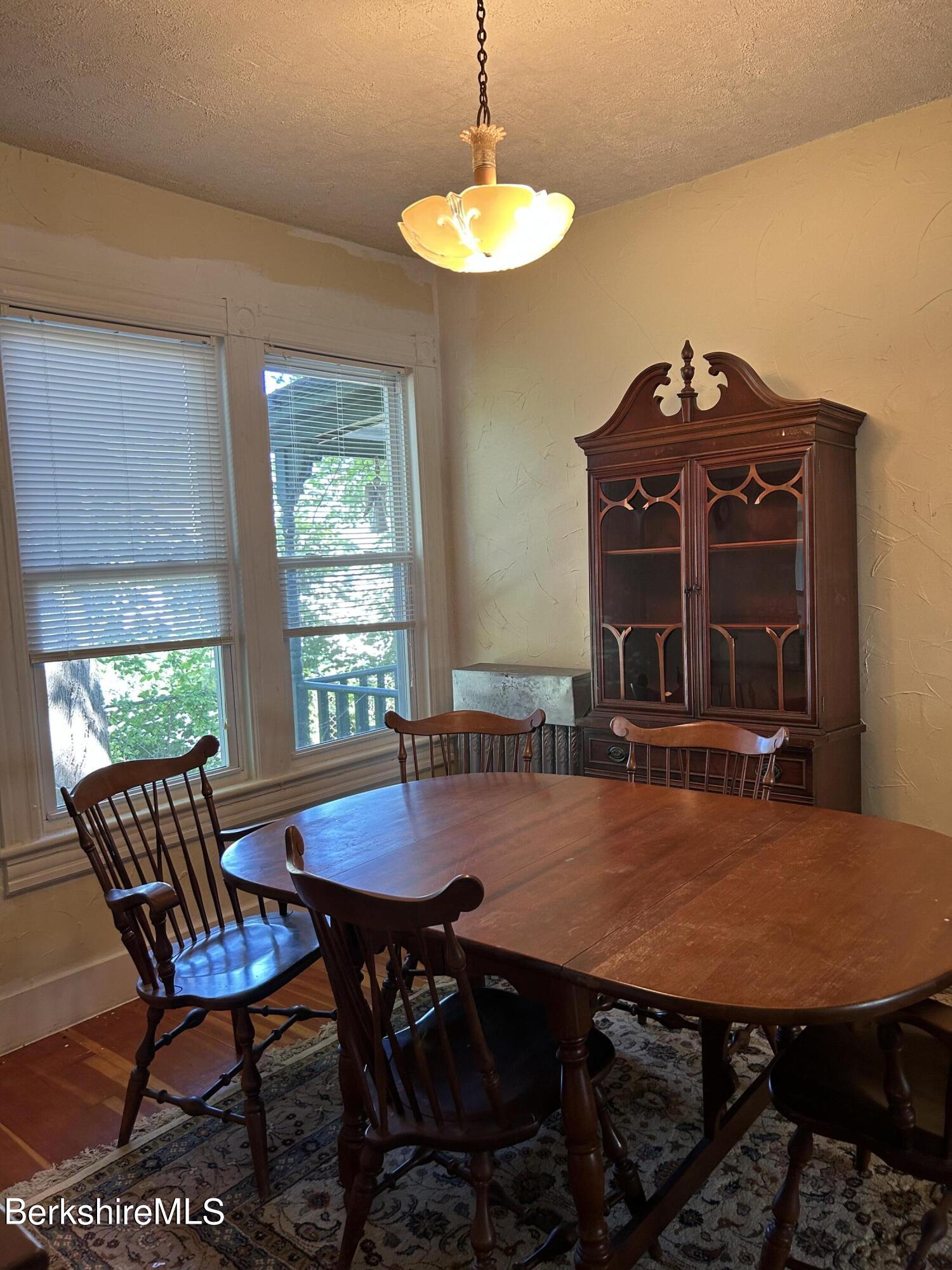 46 Summer Street Adams, MA 01220 - Photo 6 of 35 a view of a dining room with furniture and window