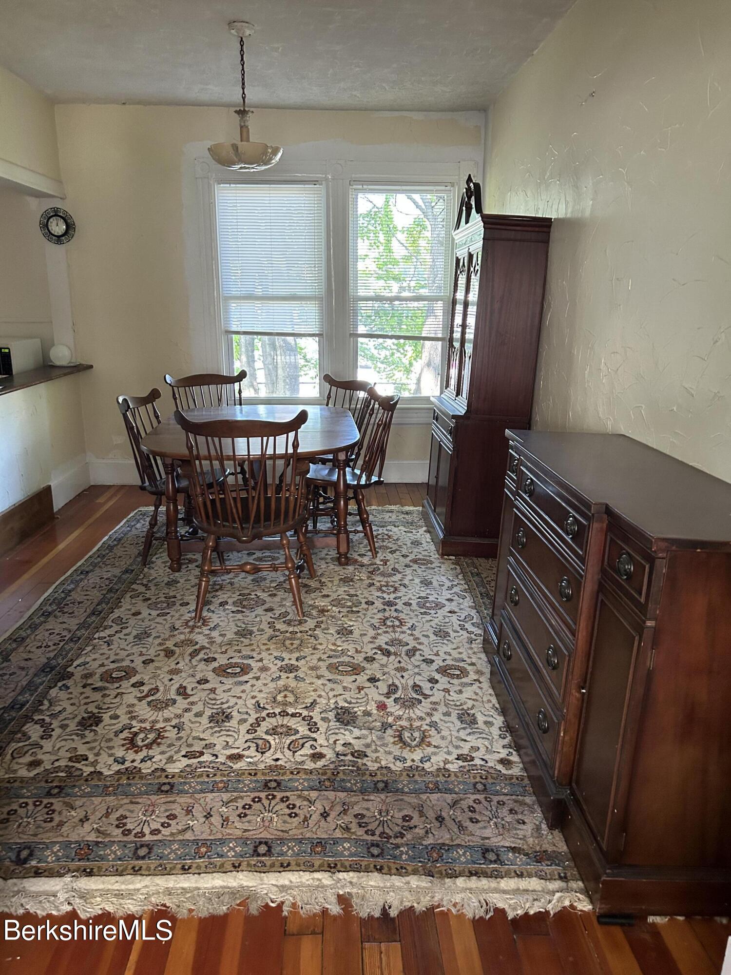 46 Summer Street Adams, MA 01220 - Photo 8 of 35 a view of a dining room with furniture window and wooden floor