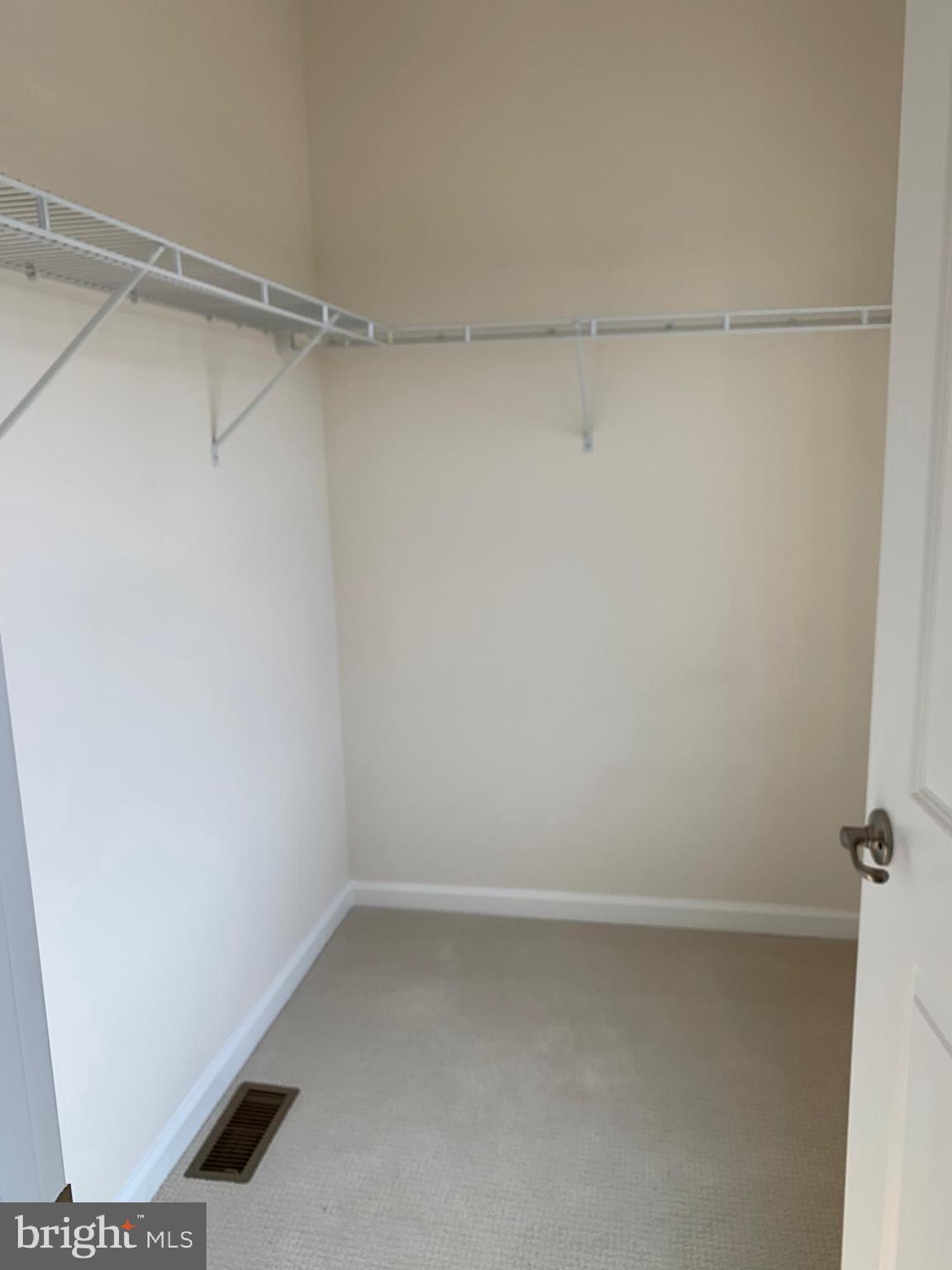 6491 Jack Linton Drive South Frederick, MD 21703 - Photo 14 of 24 a view of an empty walk in closet