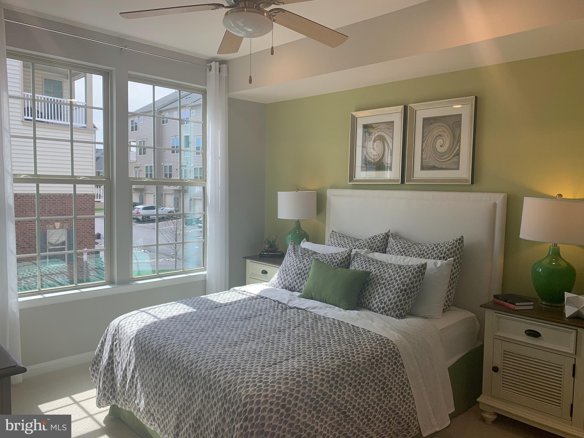 6491 Jack Linton Drive South Frederick, MD 21703 - Photo 15 of 24 a bedroom with a large bed and a window