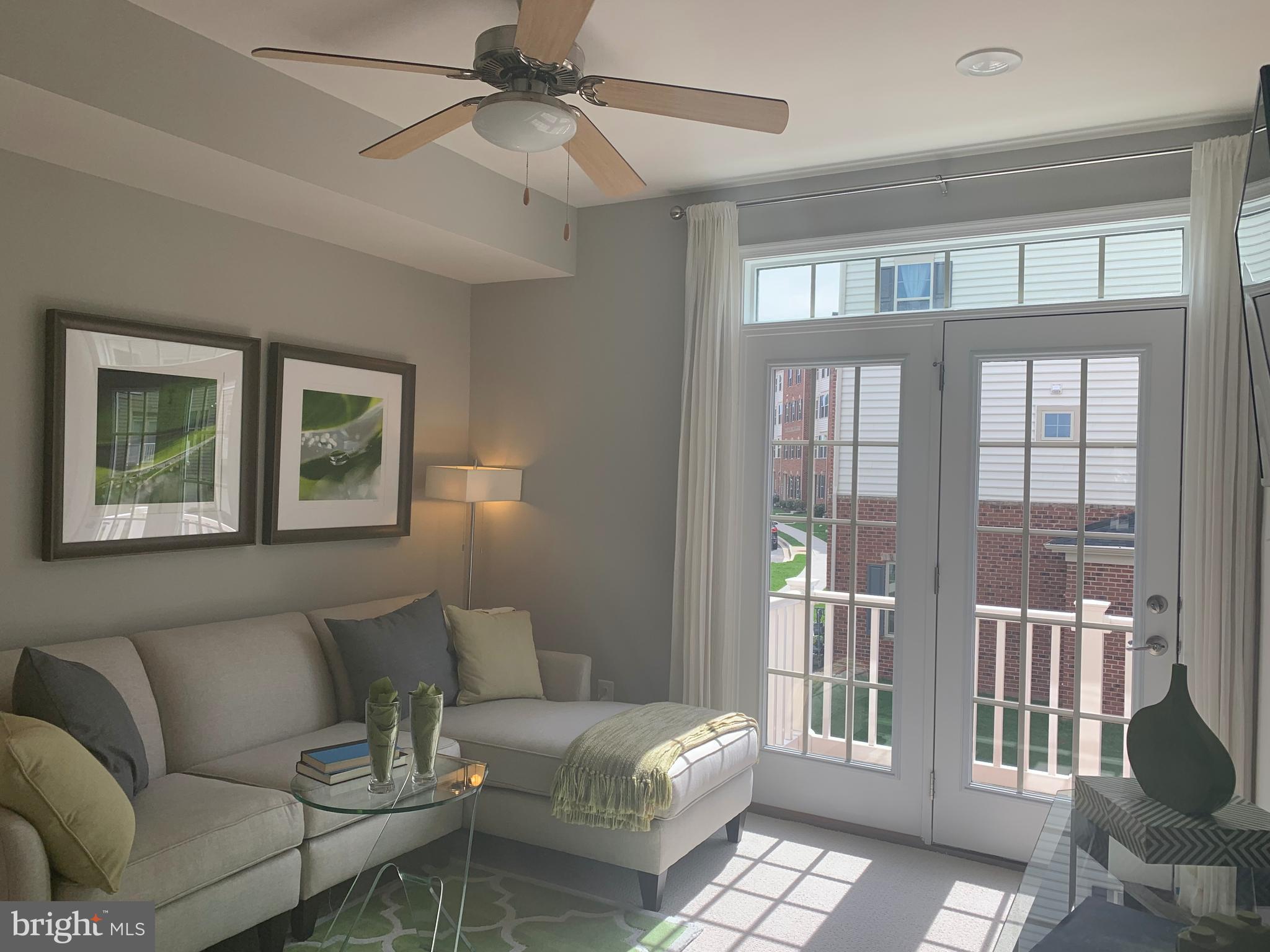 6491 Jack Linton Drive South Frederick, MD 21703 - Photo 16 of 24 a living room with furniture and a window