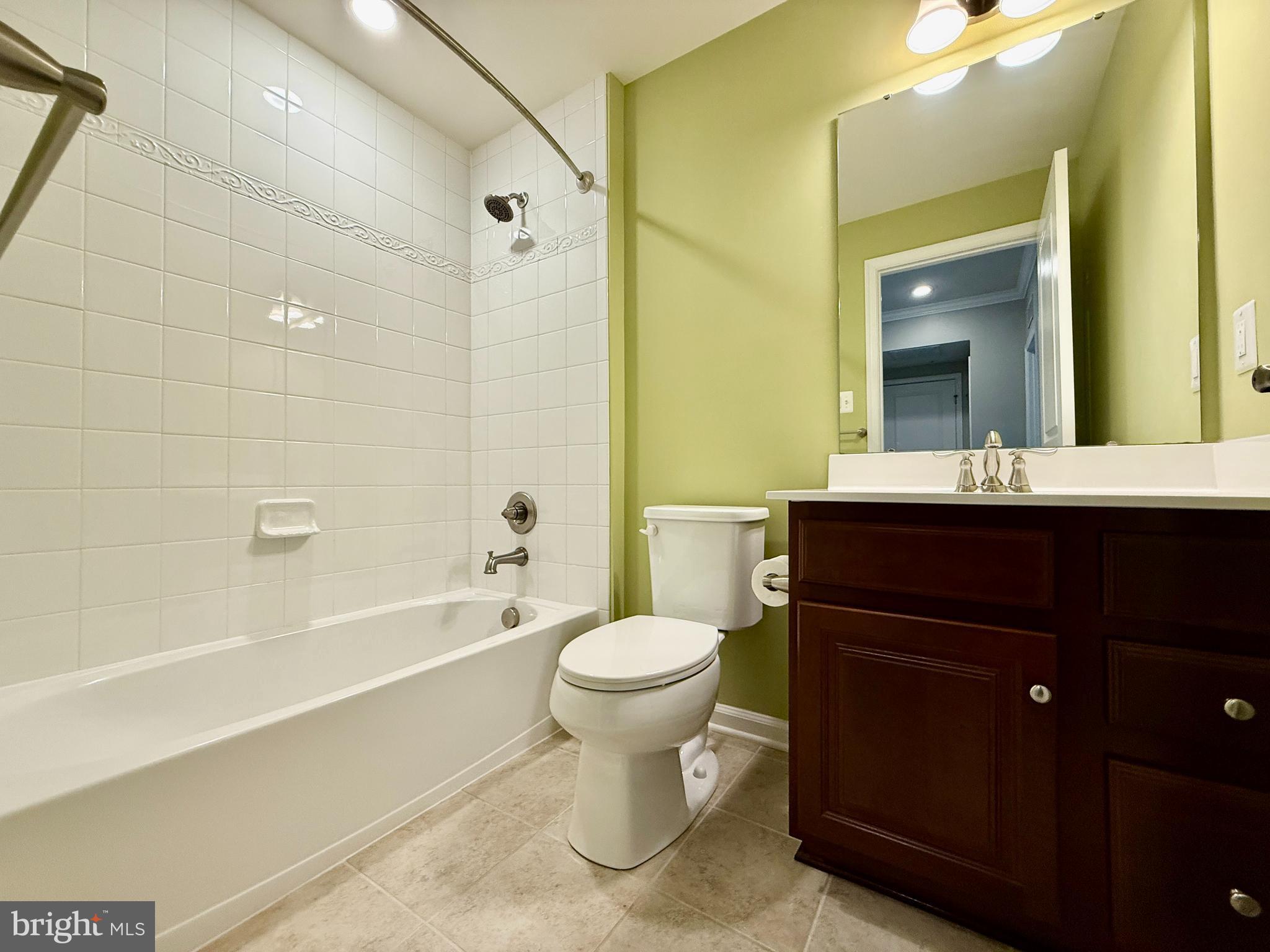 6491 Jack Linton Drive South Frederick, MD 21703 - Photo 20 of 28 a bathroom with a sink toilet and shower