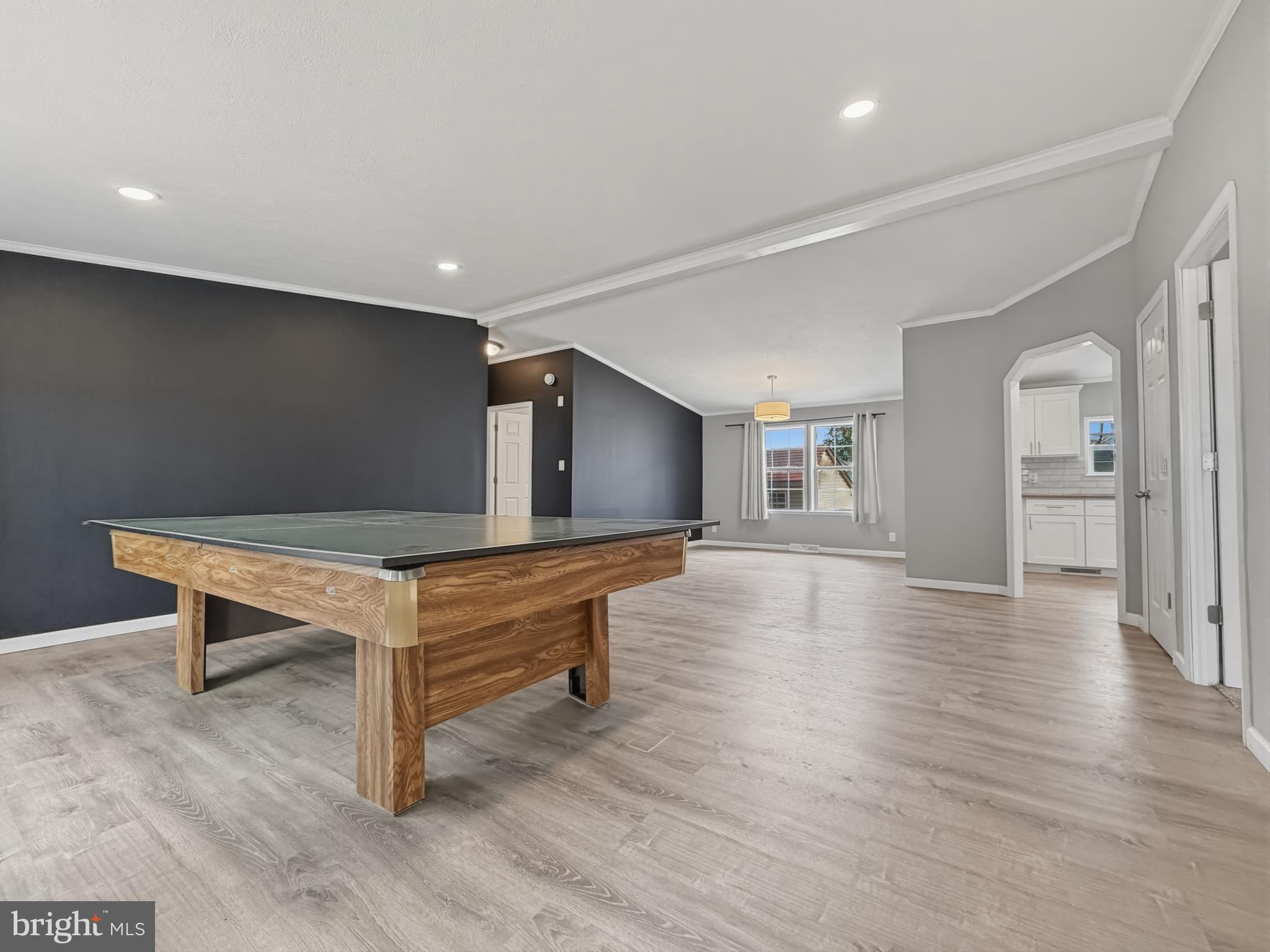 1137 2nd Avenue Croydon, PA 19021 - Photo 14 of 37 a view of an empty room with wooden floor and a window