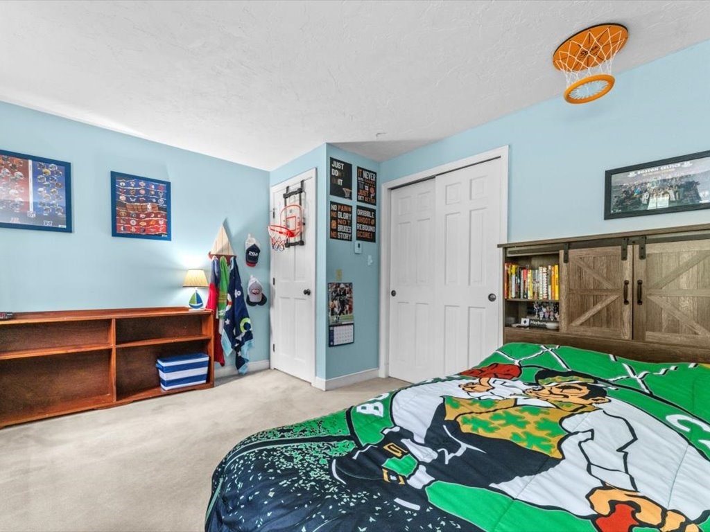 157 Harvard Road Bolton, MA 01740 - Photo 29 of 42 a bedroom with furniture and a window
