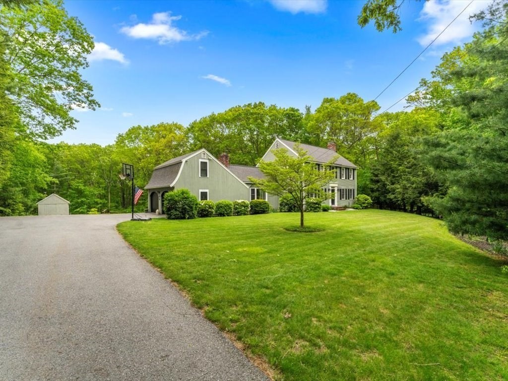 157 Harvard Road Bolton, MA 01740 - Photo 3 of 42 a view of a house with a yard
