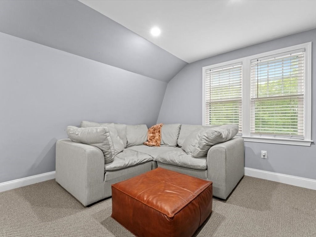 157 Harvard Road Bolton, MA 01740 - Photo 32 of 42 a living room with furniture and a window