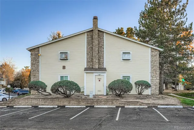 a front view of a house with garage