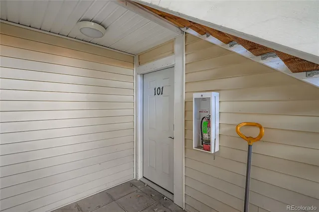 a view of a door and a window