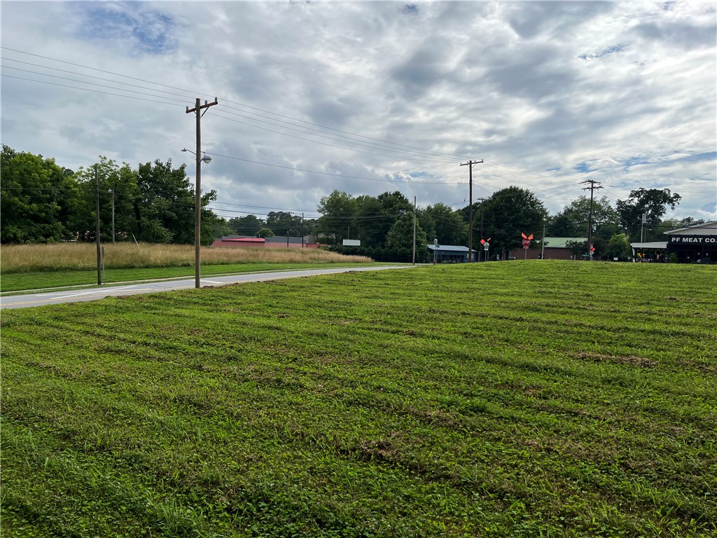 237 East Main Street Pendleton, SC 29670 - Photo 16 of 16 A spacious green parcel offers prime development potential with street frontage and utility access.