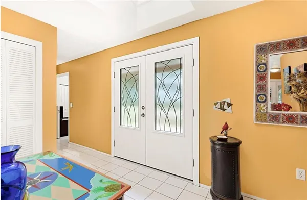 a view of entryway with wooden floor