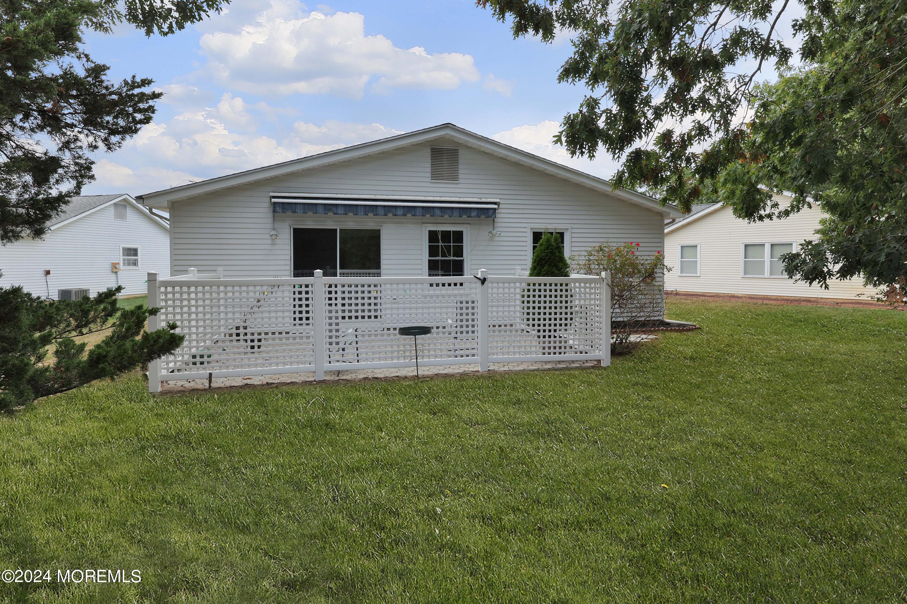 98 Greenbriar Boulevard Brick, NJ 08724 - Photo 28 of 31 a view of a house with a yard
