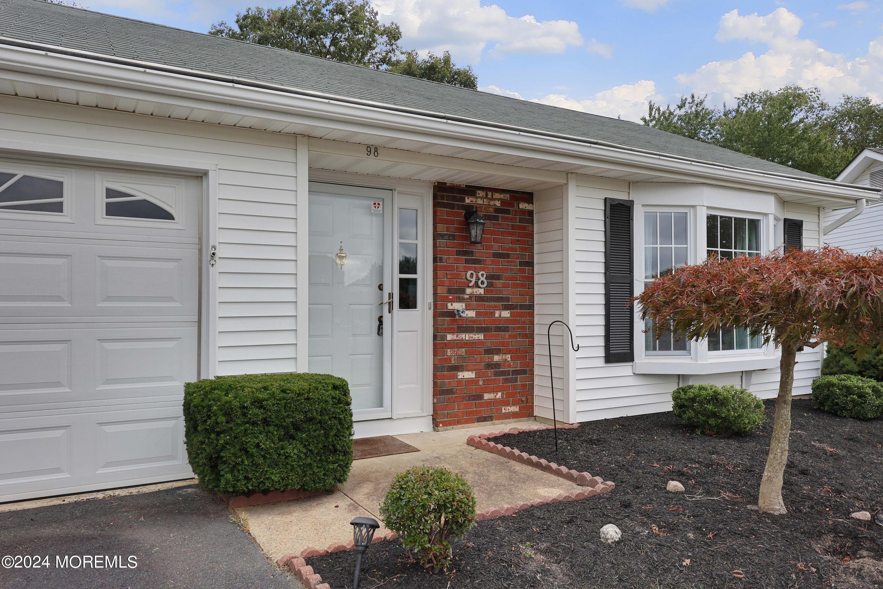 98 Greenbriar Boulevard Brick, NJ 08724 - Photo 4 of 31 a view of a house with a yard