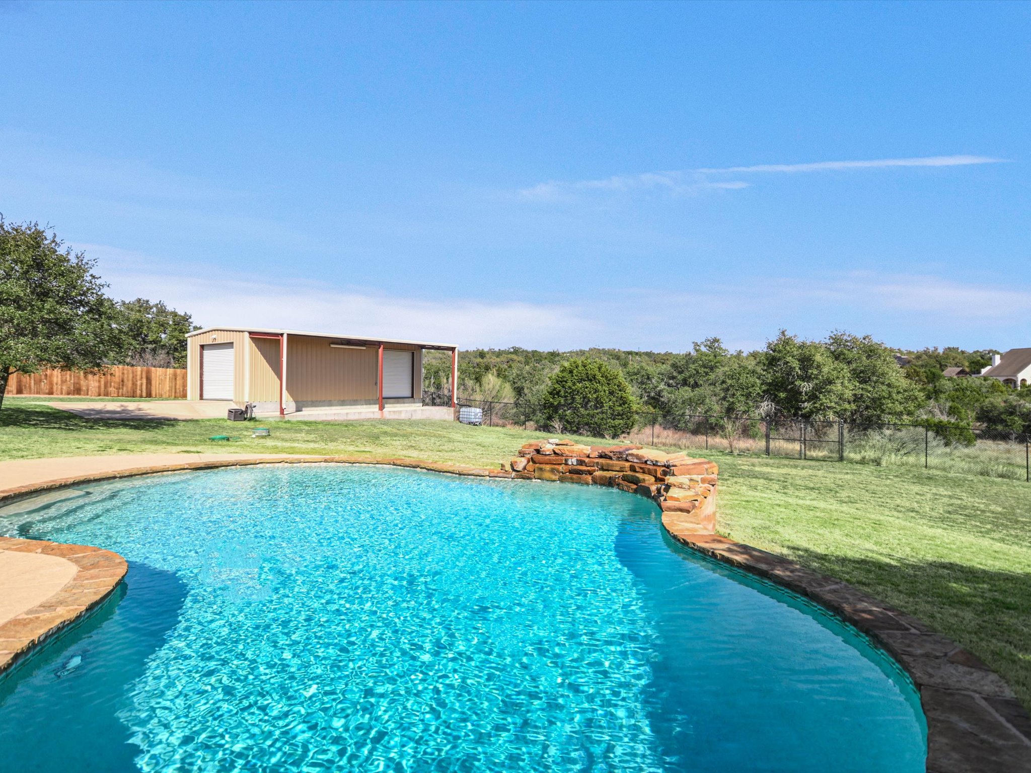 10111 Baxter Lane Austin, TX 78736 - Photo 28 of 35 a view of a house with a big yard