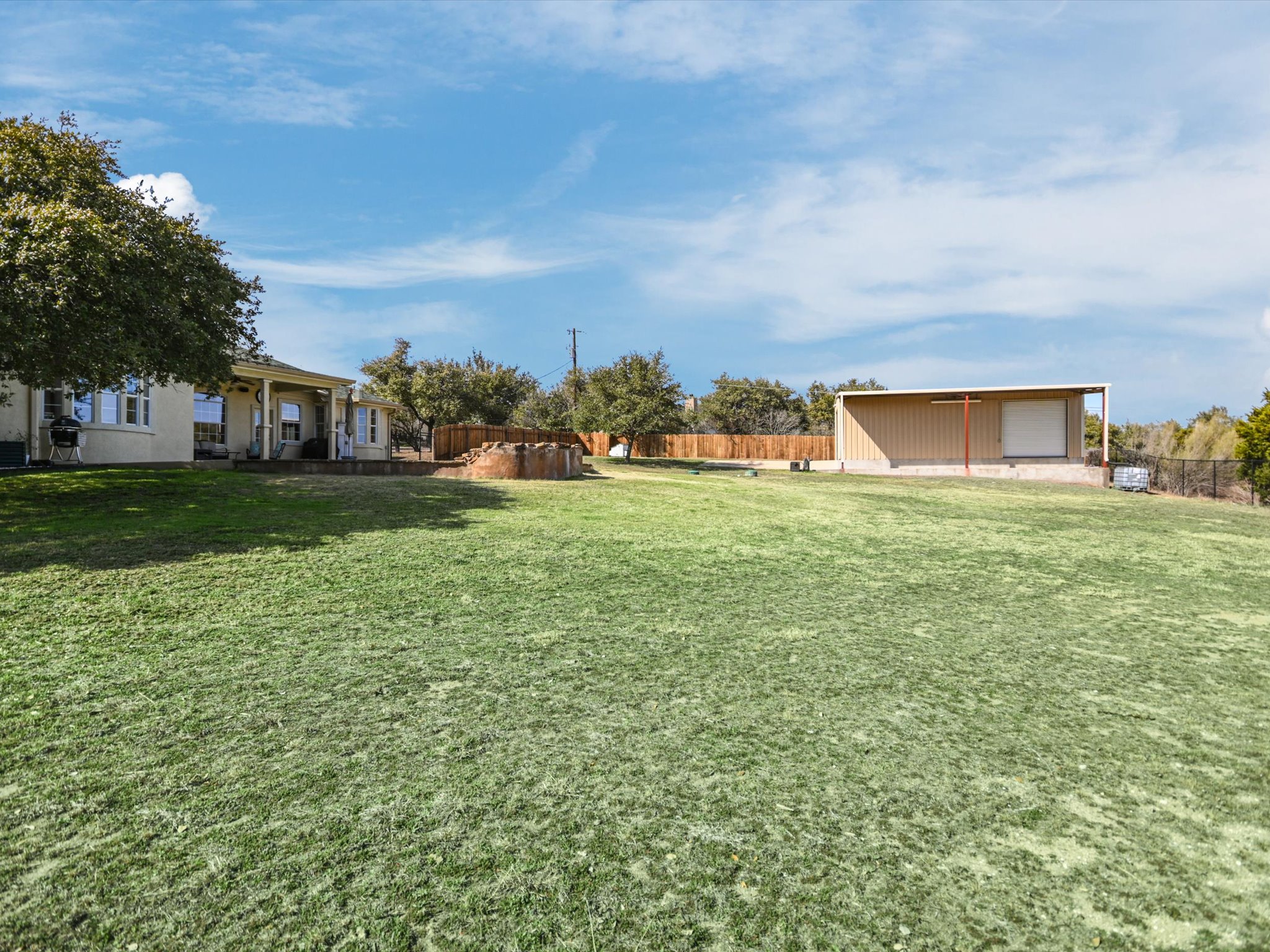 10111 Baxter Lane Austin, TX 78736 - Photo 30 of 35 a view of a big yard with palm trees