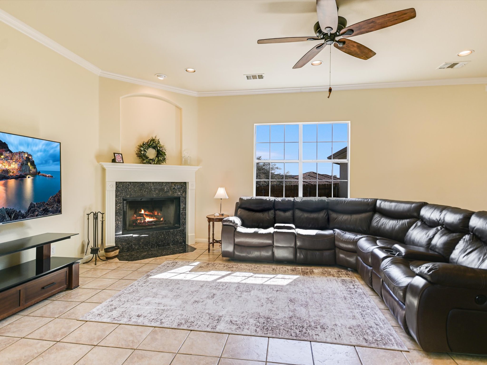10111 Baxter Lane Austin, TX 78736 - Photo 8 of 35 a living room with furniture and a fireplace