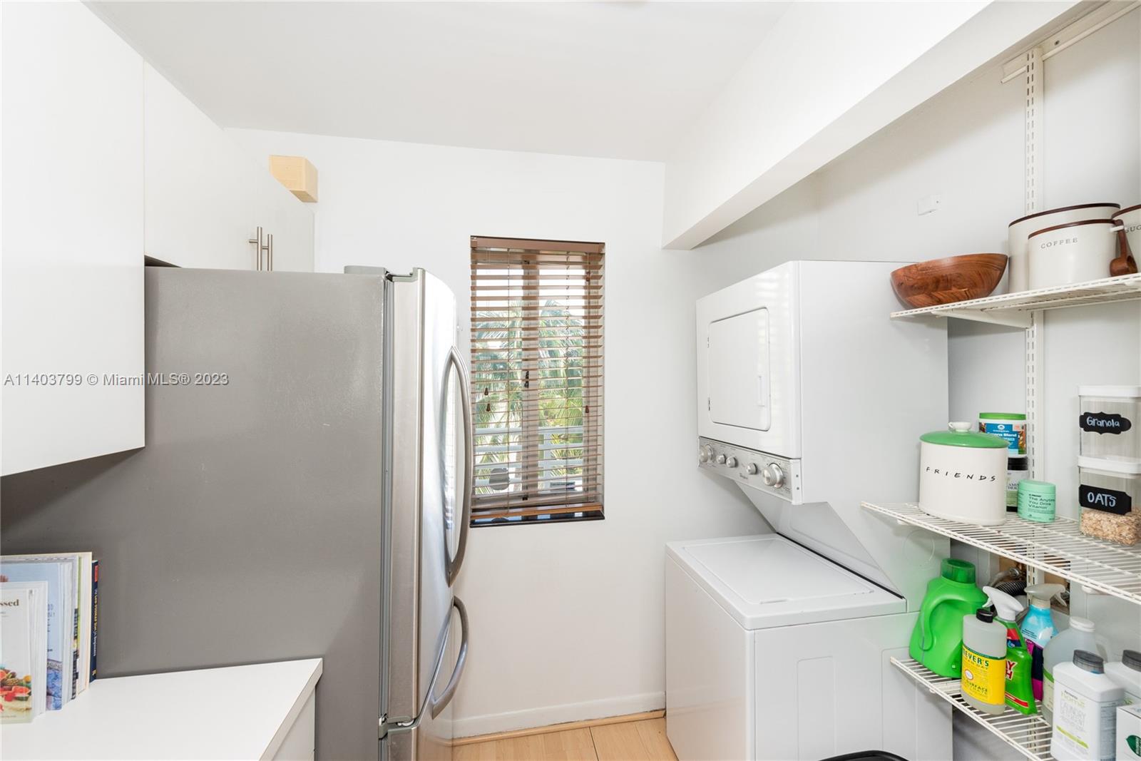 1401 Bay Road, Unit 503 Miami Beach, FL 33139 - Photo 11 of 18 a utility room with dryer and washer