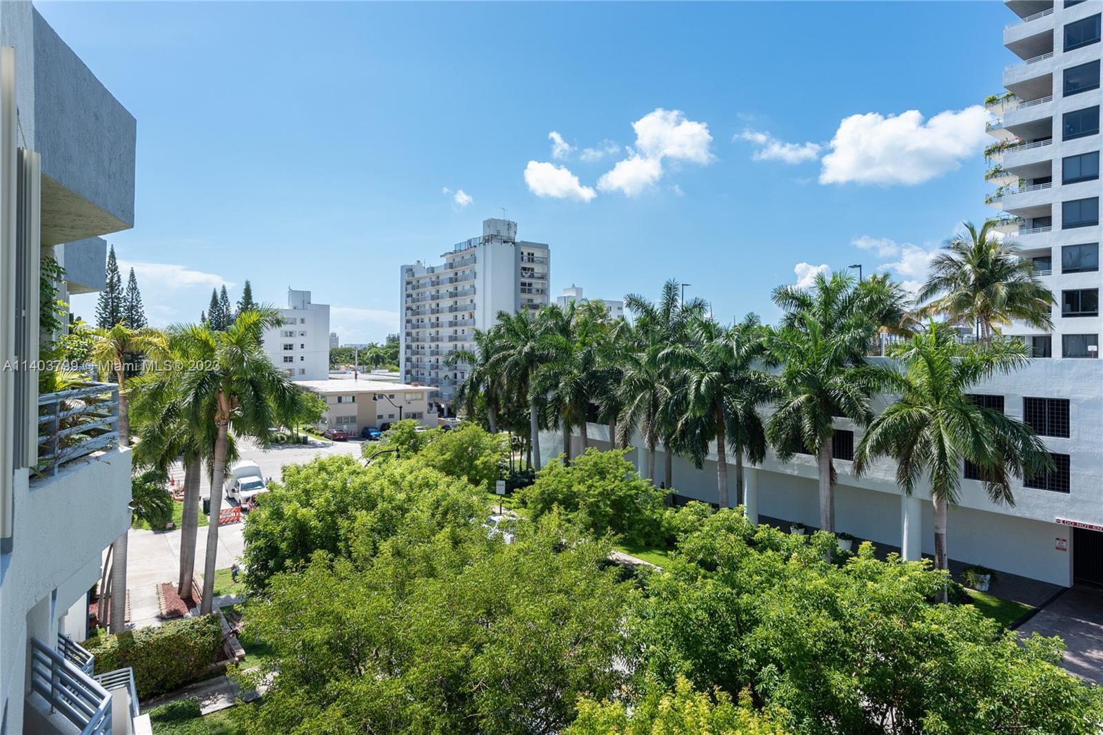 1401 Bay Road, Unit 503 Miami Beach, FL 33139 - Photo 5 of 18 a view of a house with a flower garden