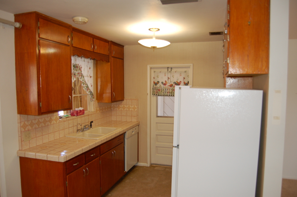 3008 East Osborn Road Phoenix, AZ 85016 - Photo 3 of 8 a bathroom with a sink a mirror and a shower