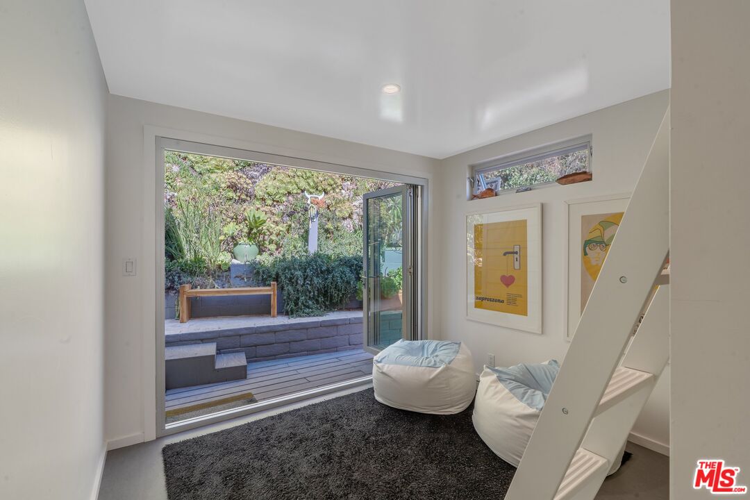 29 Paradise Cove Road Malibu, CA 90265 - Photo 11 of 30 a living room with furniture and a large window