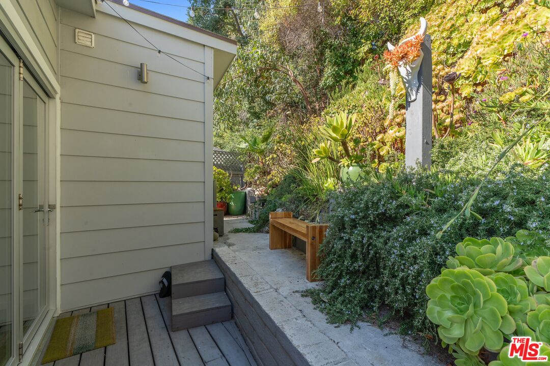 29 Paradise Cove Road Malibu, CA 90265 - Photo 14 of 30 a backyard of a house with outdoor seating