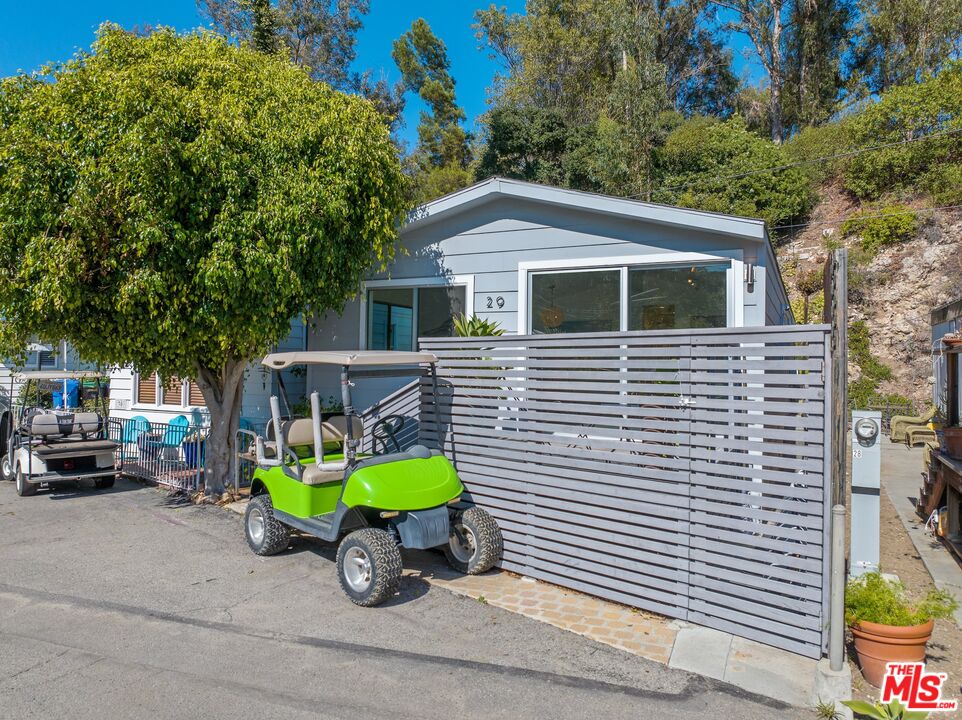 29 Paradise Cove Road Malibu, CA 90265 - Photo 17 of 30 a green house with a outdoor space