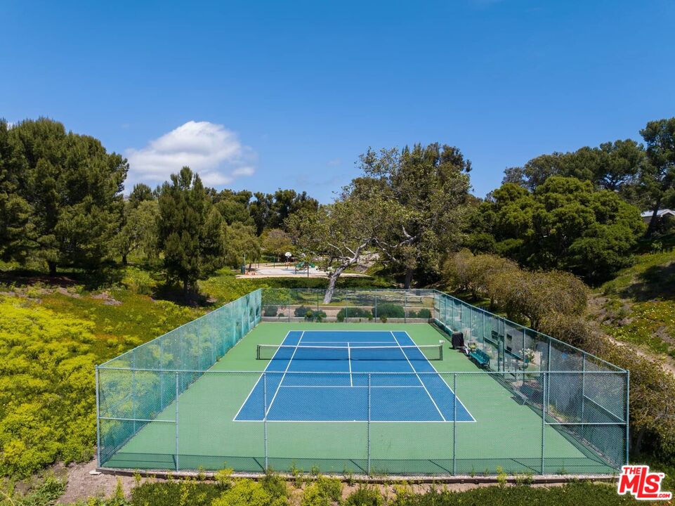 29 Paradise Cove Road Malibu, CA 90265 - Photo 21 of 30 a view of a backyard with swimming pool