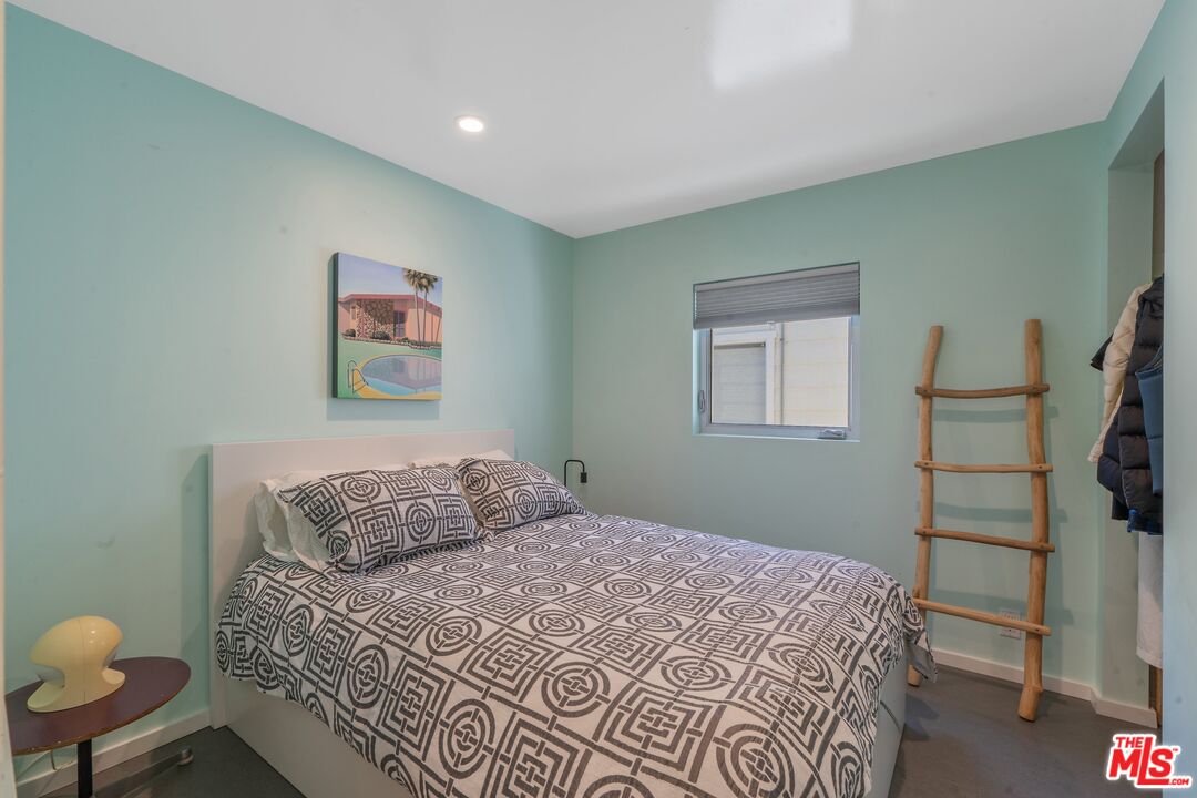 29 Paradise Cove Road Malibu, CA 90265 - Photo 6 of 30 a bedroom with a bed and furniture