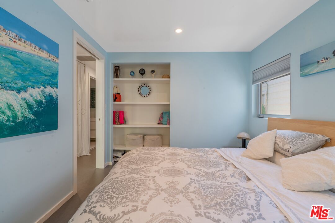 29 Paradise Cove Road Malibu, CA 90265 - Photo 9 of 30 a bedroom with a bed and a window