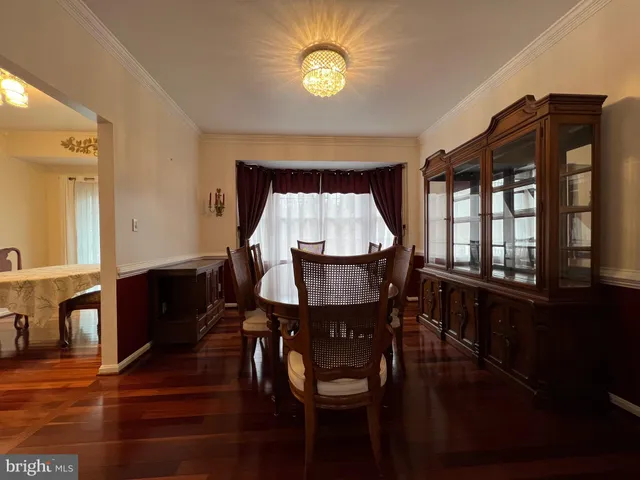 a view of a chair and table on the deck