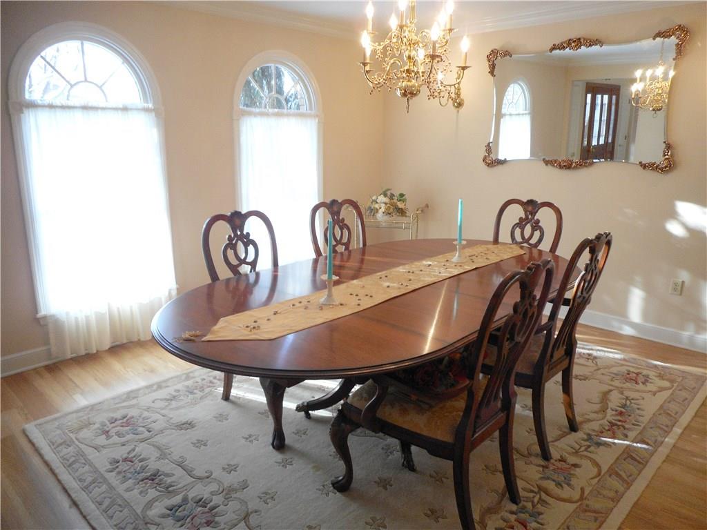 265 Rutledge Drive Canonsburg, PA 15317 - Photo 2 of 24 Dining Room: Gracious entertaining will be yours in the wonderfully bright dining room with crown molding, Palladium windows and blonde oak hardwood flooring.