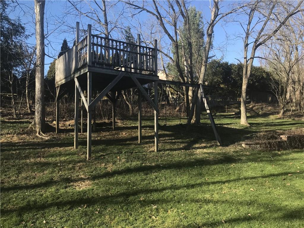 265 Rutledge Drive Canonsburg, PA 15317 - Photo 21 of 24 Yard: This wonderful home embodies all the qualities one could hope for in a quiet and serene setting. It even includes the play fort with built in swing set