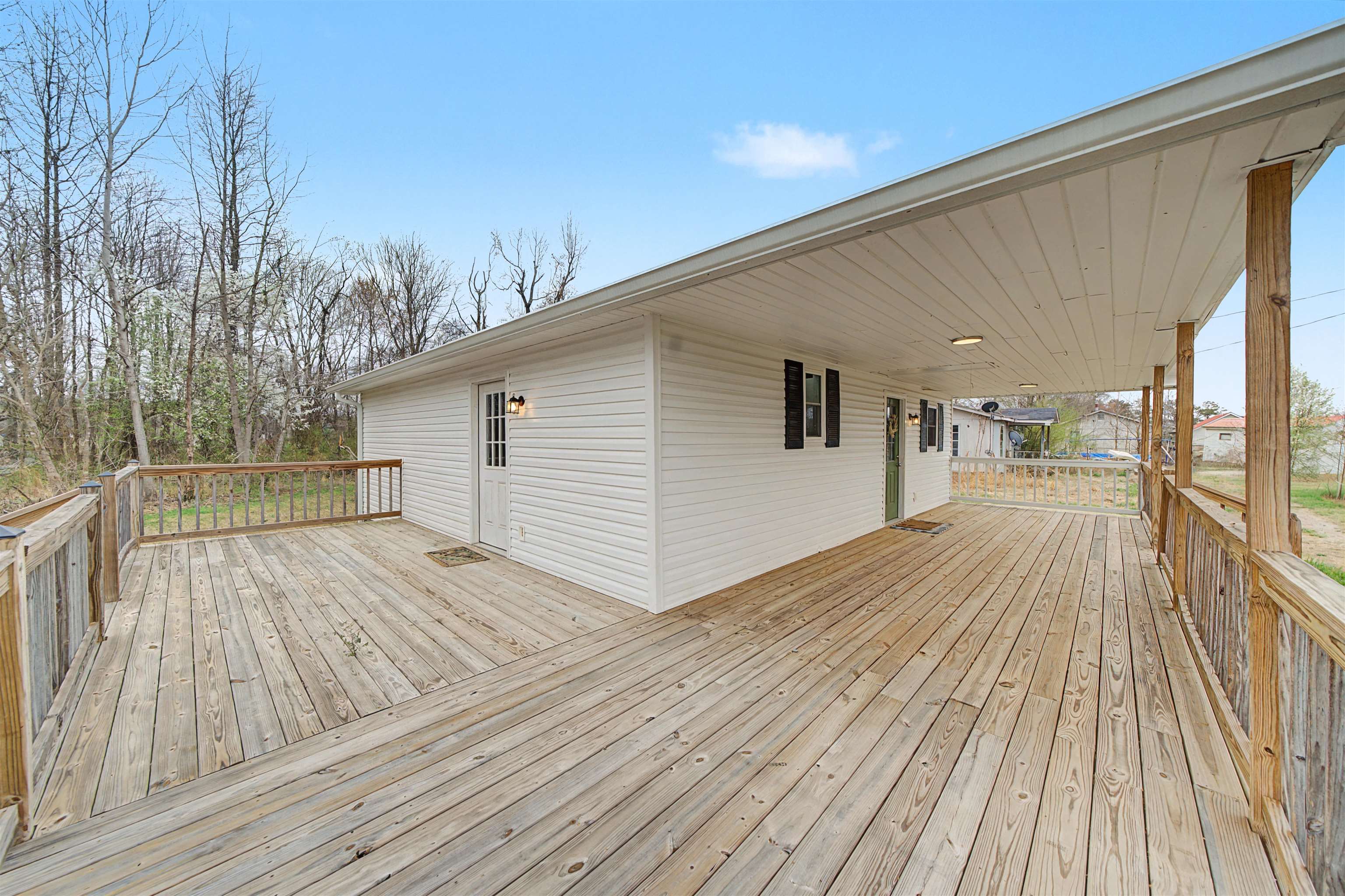 8040 45th Highway South Ramer, TN 38367 - Photo 6 of 20 a view of backyard with a deck and wooden floor