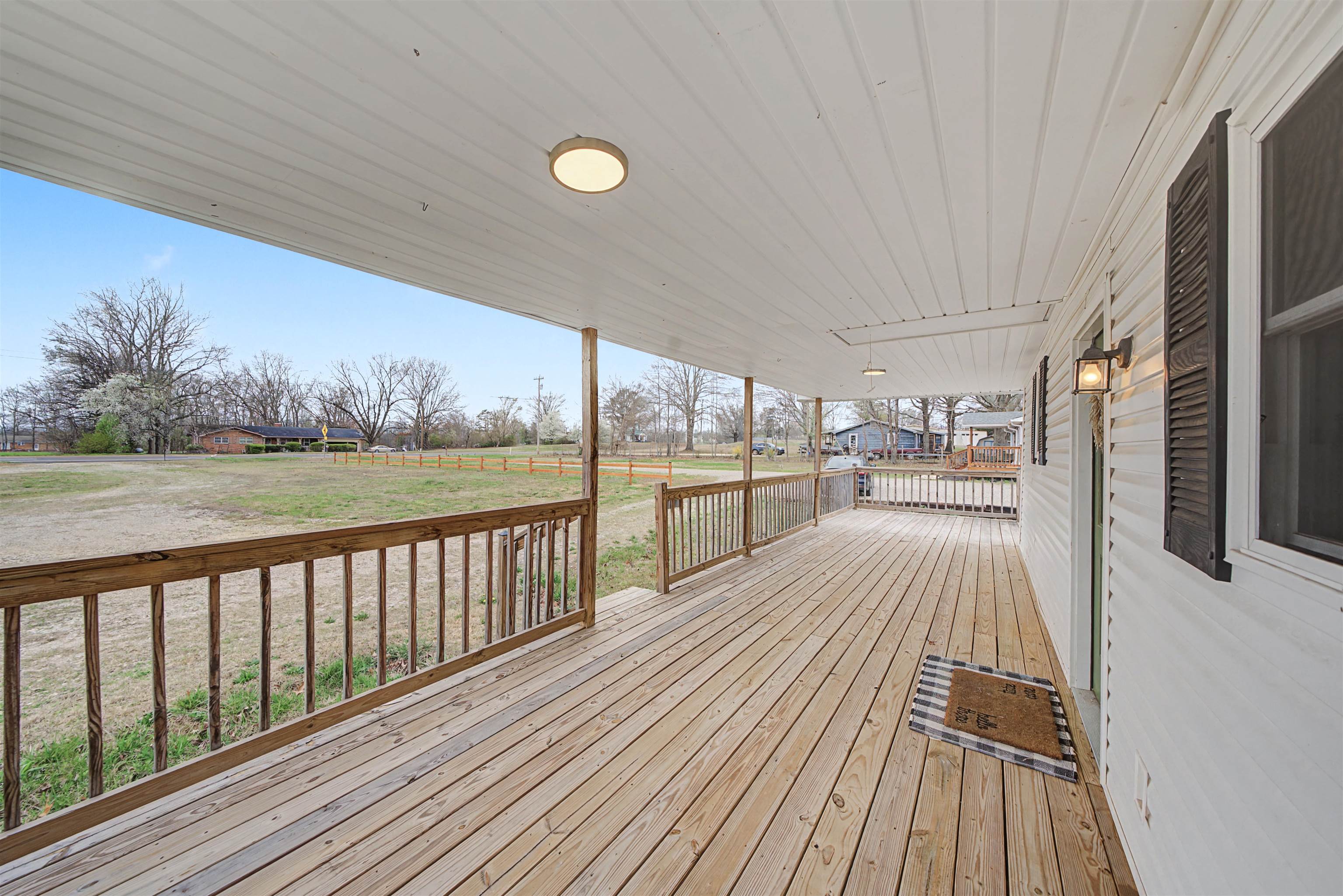 8040 45th Highway South Ramer, TN 38367 - Photo 7 of 20 a view of a balcony with wooden floor