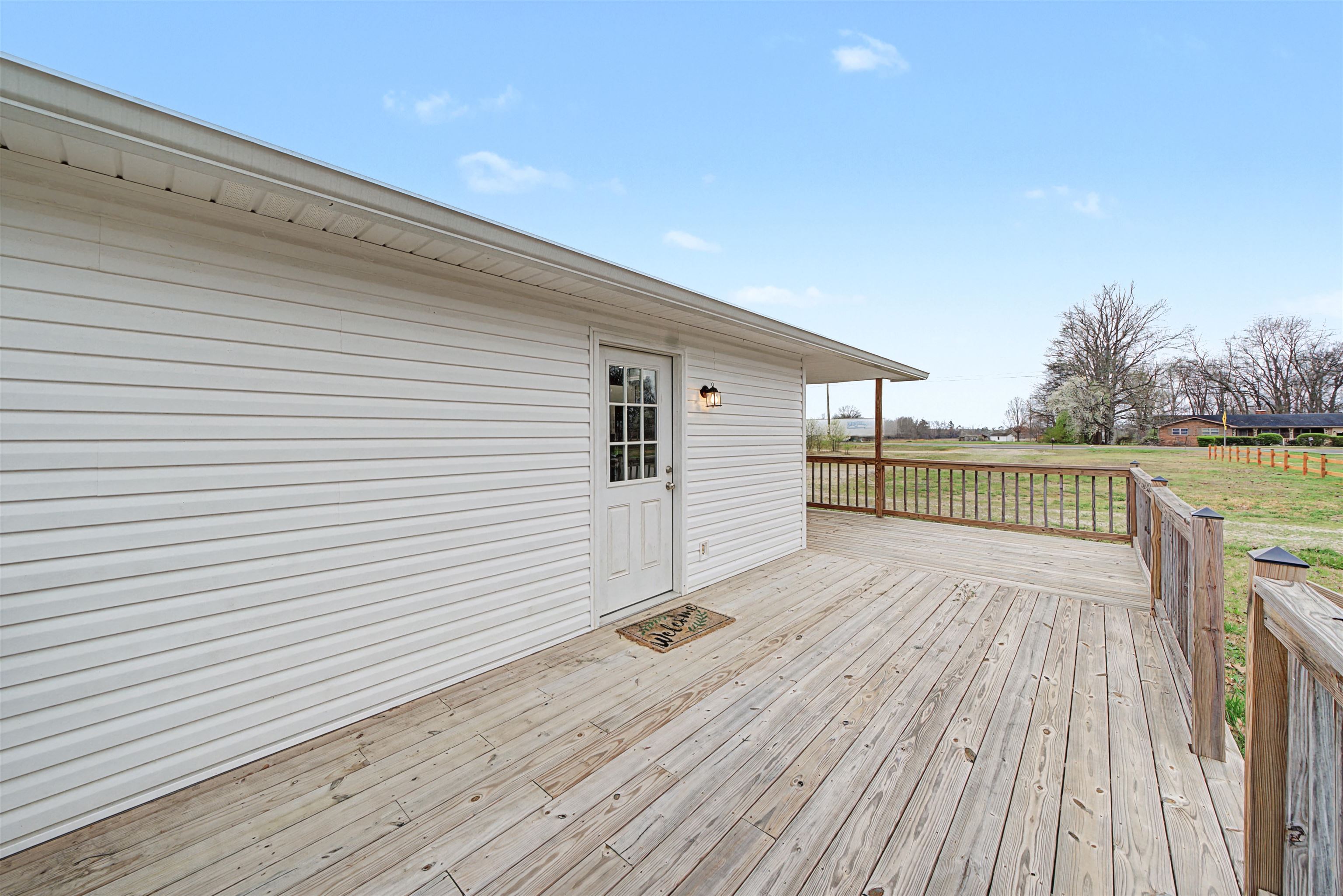 8040 45th Highway South Ramer, TN 38367 - Photo 8 of 20 a view of a balcony with wooden floor