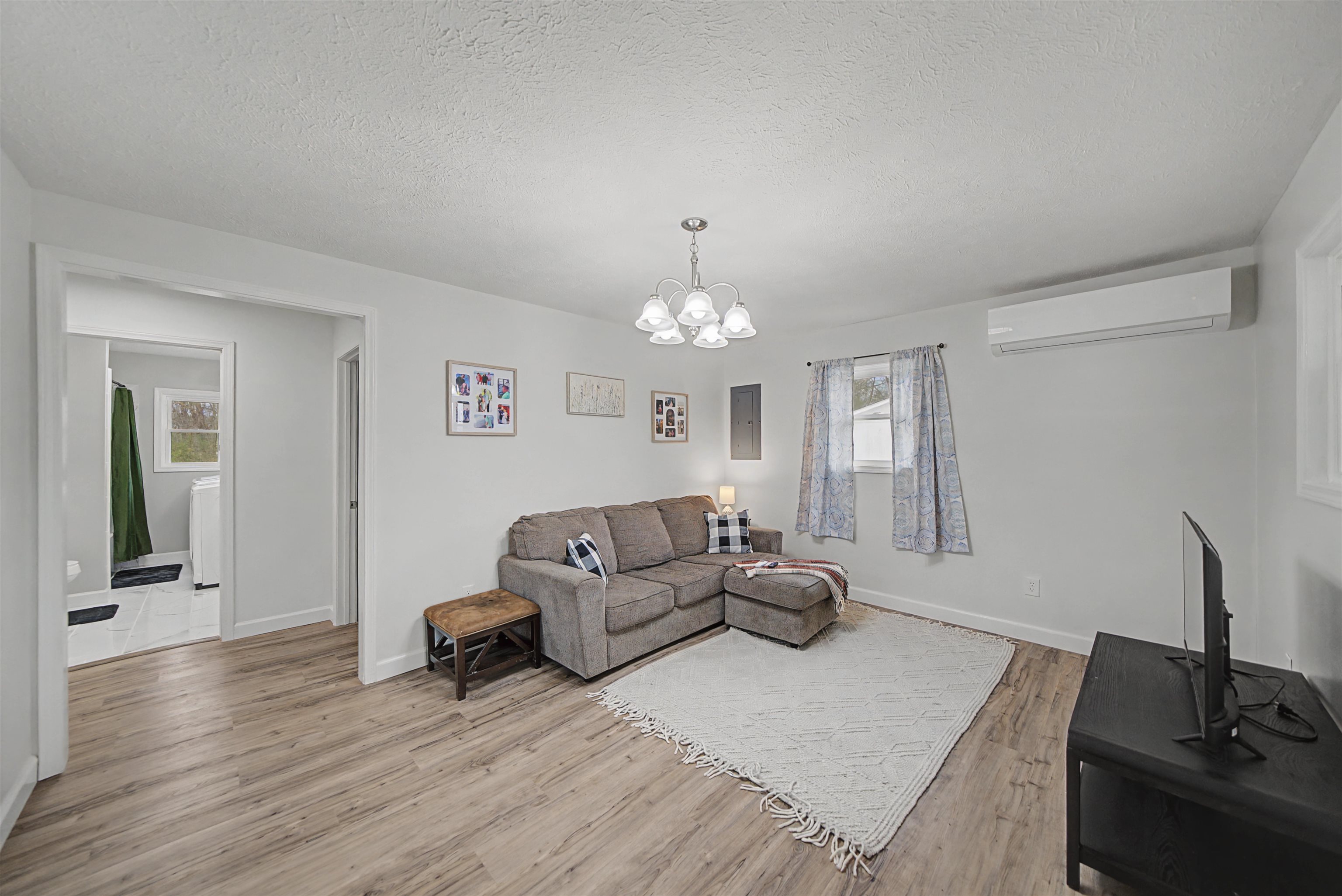8040 45th Highway South Ramer, TN 38367 - Photo 10 of 20 a living room with furniture and a wooden floor