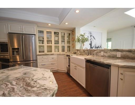 67 Hartness Road Sutton, MA 01590 - Photo 10 of 30 a kitchen with a sink stove and refrigerator