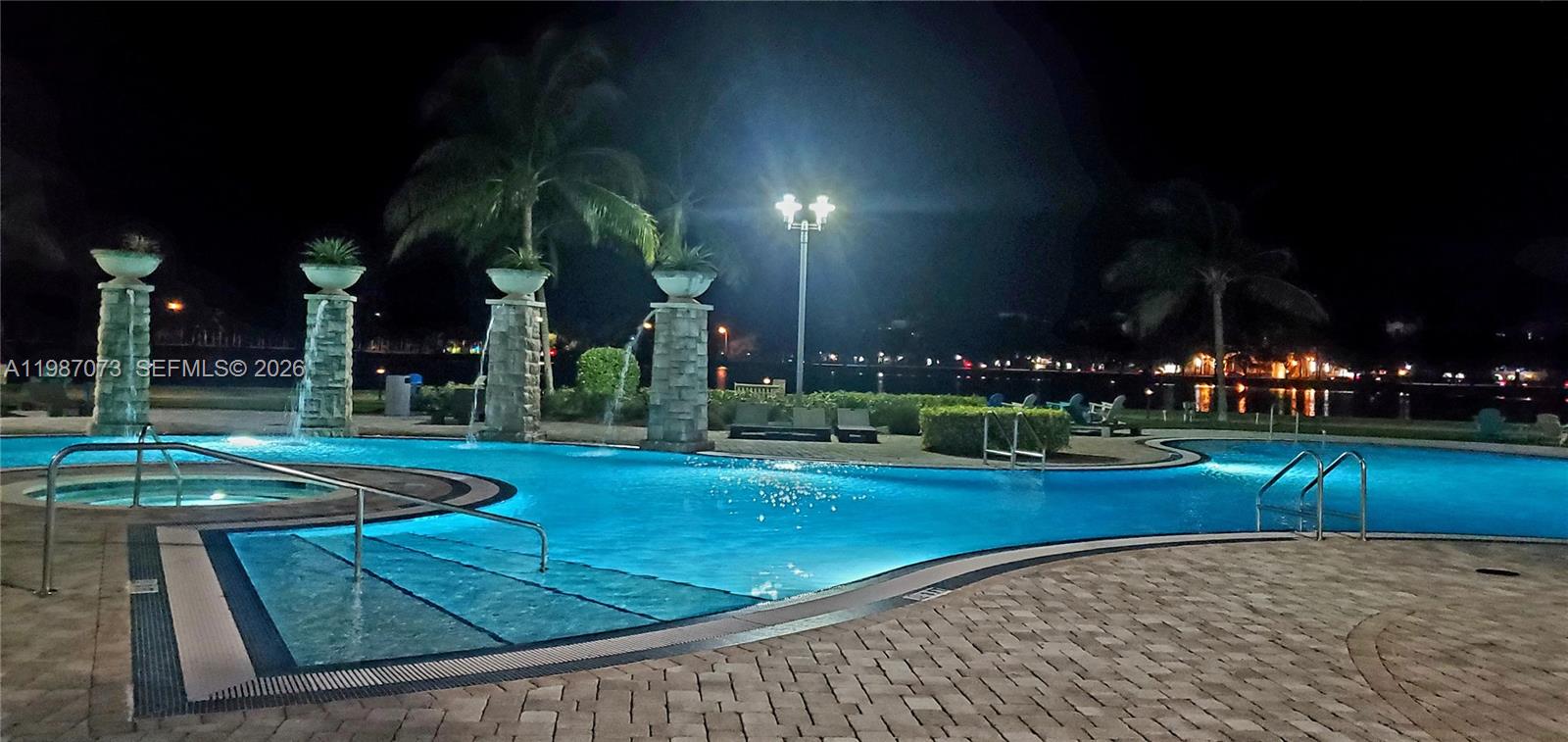 2641 North Flamingo Road, Unit 2607N Sunrise, FL 33323 - Photo 48 of 69 a view of outdoor space yard and swimming pool