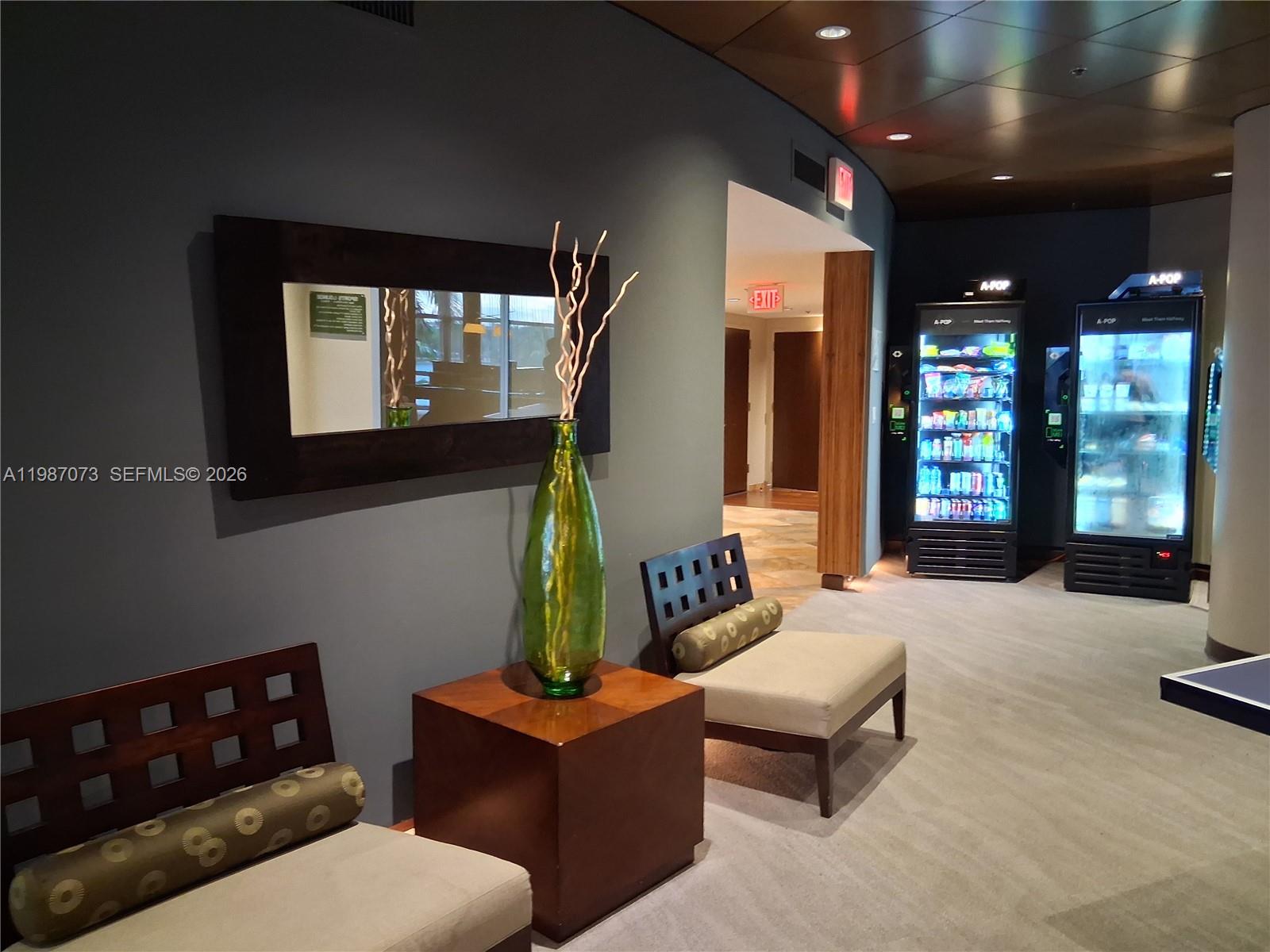 2641 North Flamingo Road, Unit 2607N Sunrise, FL 33323 - Photo 61 of 69 a living room with furniture and window