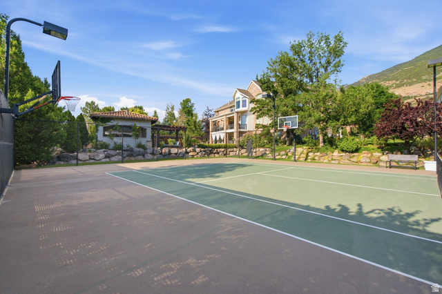 12308 Mariah Circle Draper, UT 84020 - Photo 249 of 293 Multi-sport court featuring a tennis net and two basketball hoops with integrated lighting