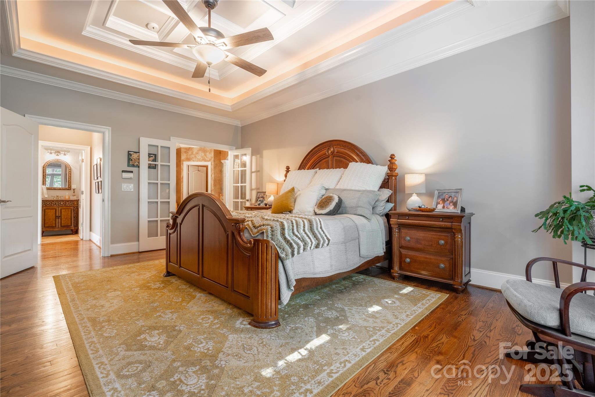 1427 Merrimont Avenue Kings Mountain, NC 28086 - Photo 16 of 48 a bedroom with a bed and wooden floor