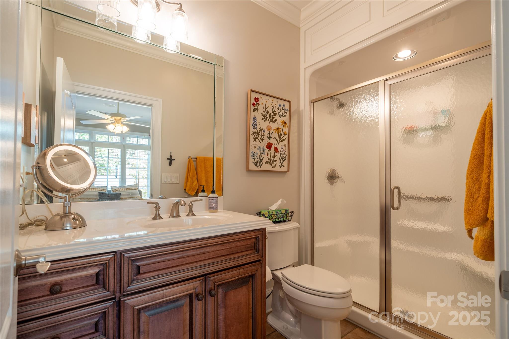 1427 Merrimont Avenue Kings Mountain, NC 28086 - Photo 21 of 48 a bathroom with a granite countertop toilet sink and a mirror