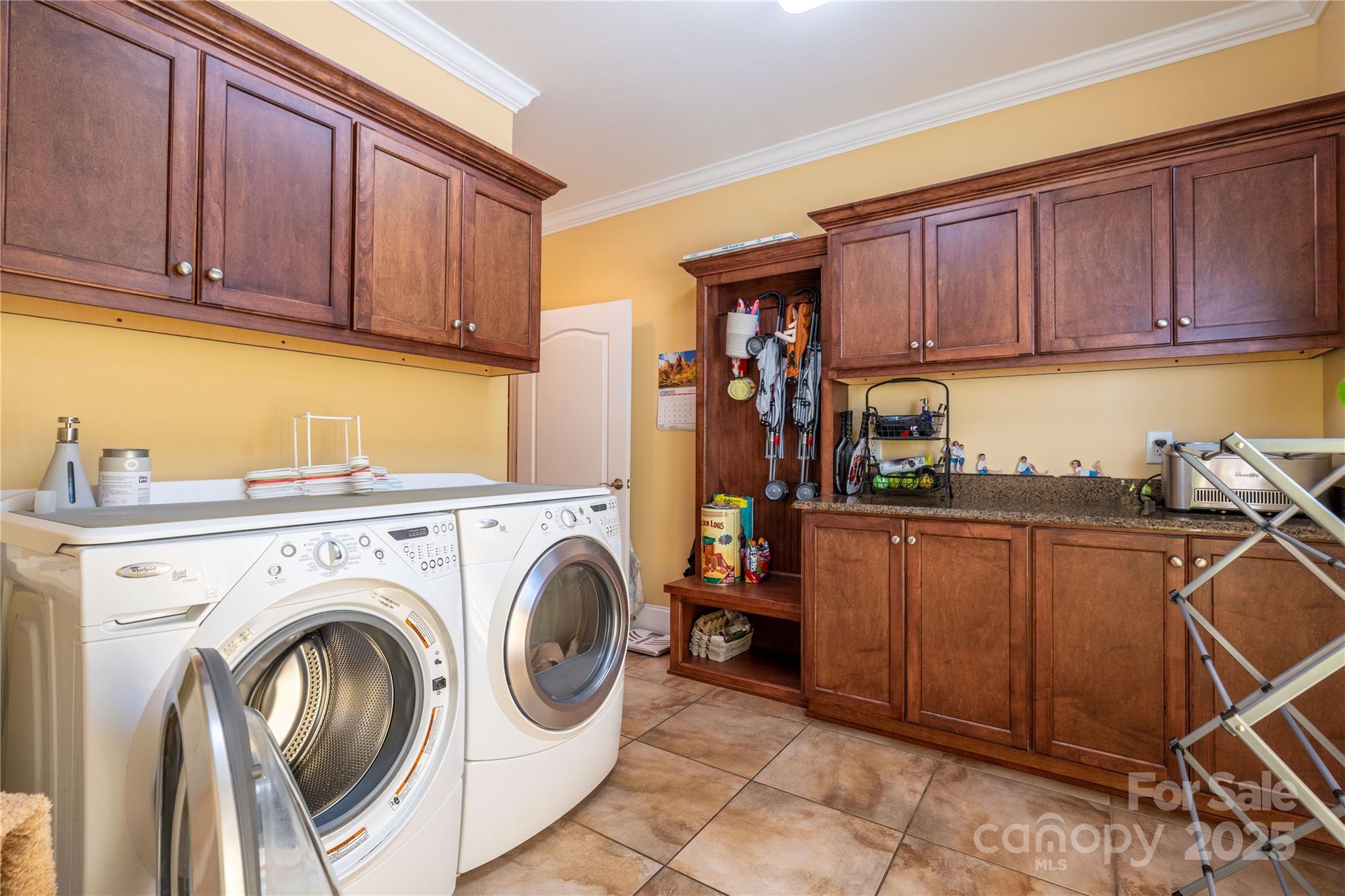 1427 Merrimont Avenue Kings Mountain, NC 28086 - Photo 27 of 48 a view of a kitchen with washer and dryer
