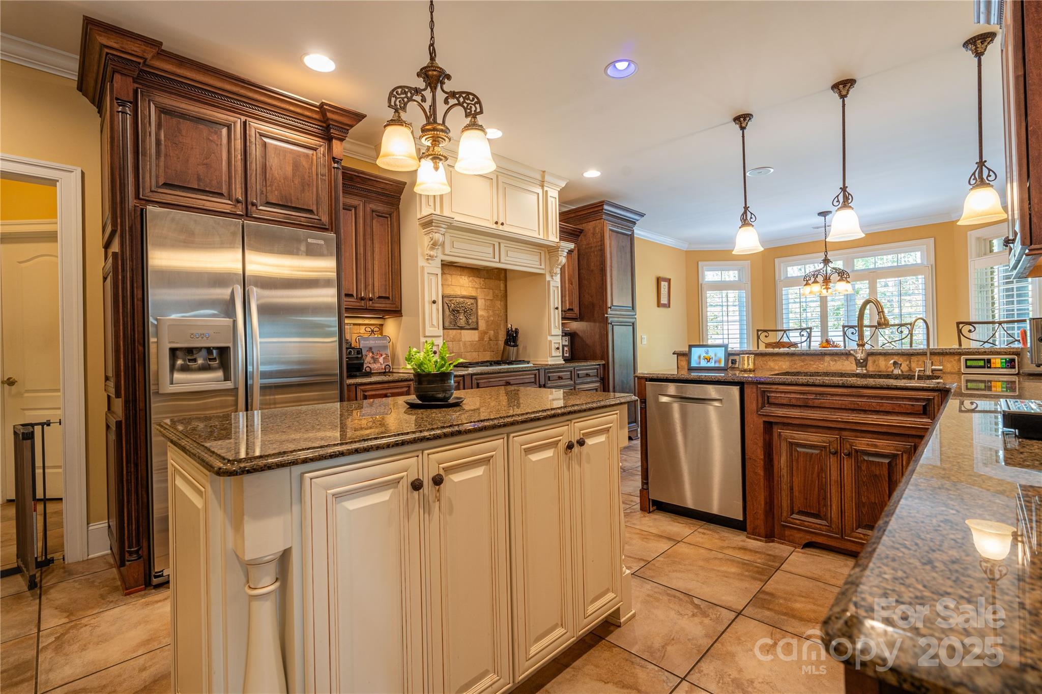 1427 Merrimont Avenue Kings Mountain, NC 28086 - Photo 7 of 48 a kitchen with stainless steel appliances granite countertop a refrigerator a oven and a sink