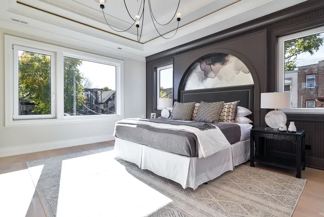 a bathroom with a granite countertop shower sink and mirror