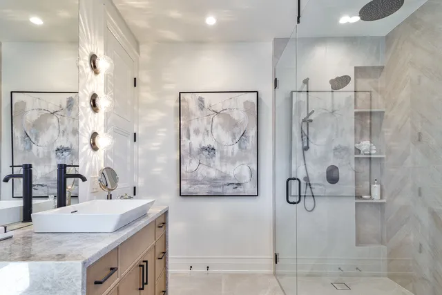 a bathroom with a sink a toilet and tub