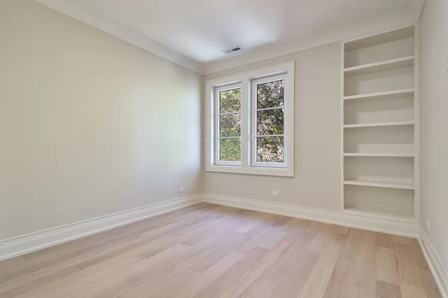 a view of empty room with windows