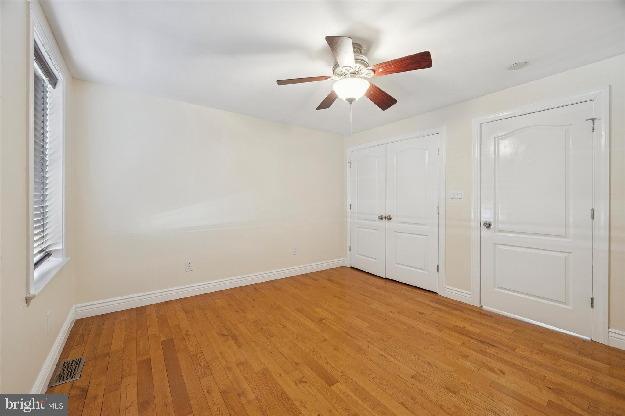 341 Dickinson Street Philadelphia, PA 19147 - Photo 24 of 27 wooden floor in an empty room