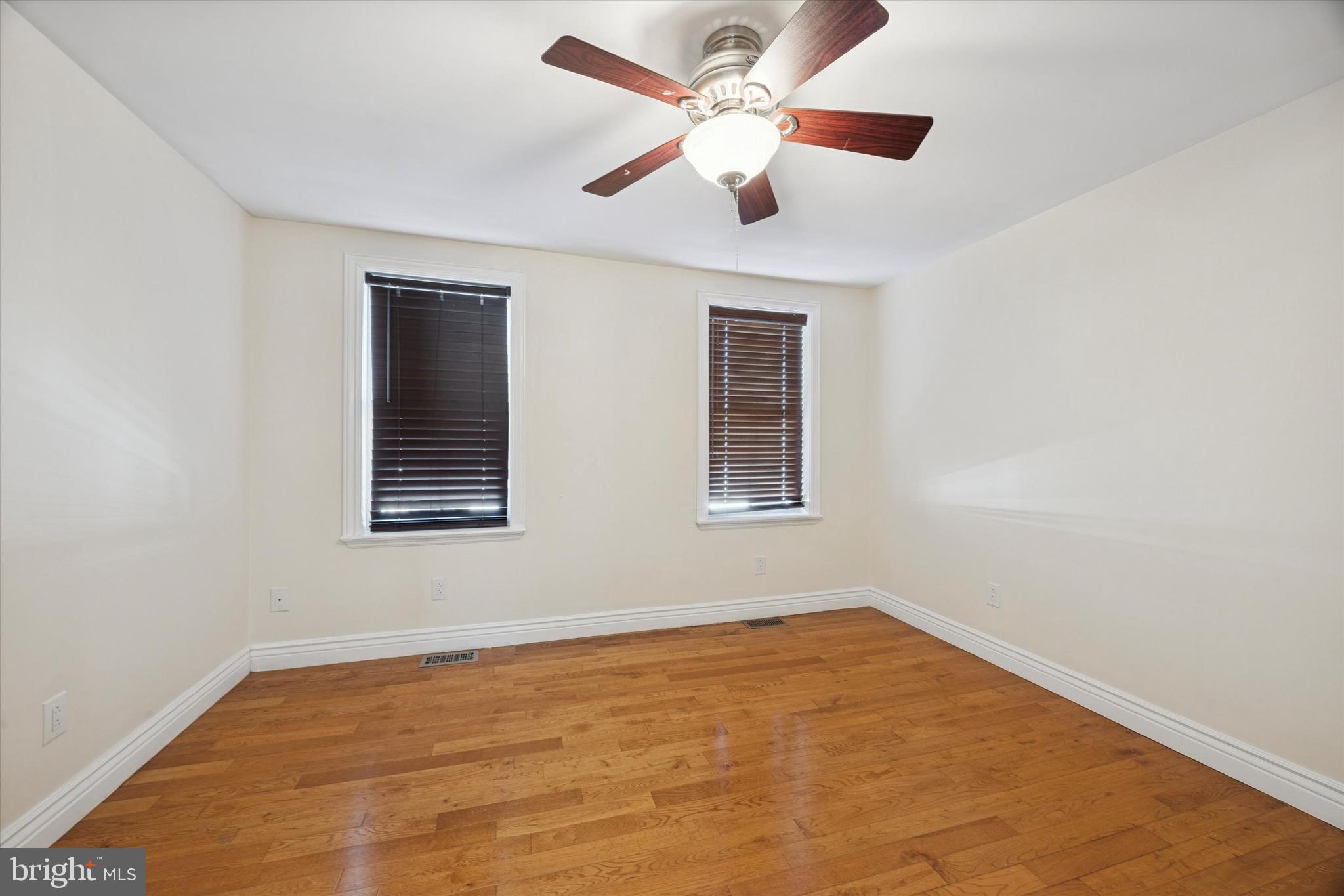 341 Dickinson Street Philadelphia, PA 19147 - Photo 25 of 27 a view of an empty room with a window